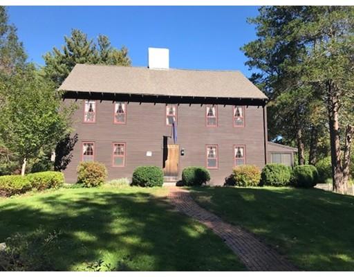 131 Spofford Road Boxford, MA 01921 - Photo 1 of 18 a front view of a house with a yard