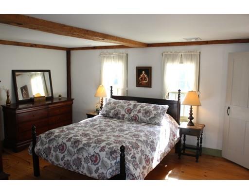 131 Spofford Road Boxford, MA 01921 - Photo 15 of 18 a bedroom with a bed and a lamp on dresser