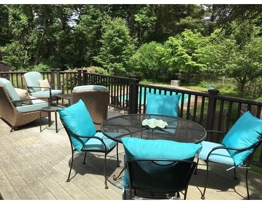 131 Spofford Road Boxford, MA 01921 - Photo 4 of 18 a view of a chairs and table in patio