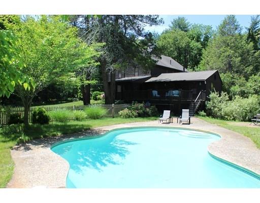 131 Spofford Road Boxford, MA 01921 - Photo 5 of 18 a front view of a house with a yard