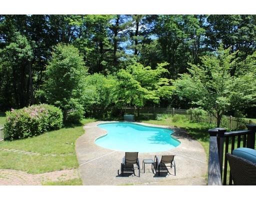 131 Spofford Road Boxford, MA 01921 - Photo 6 of 18 a view of a backyard with seating area