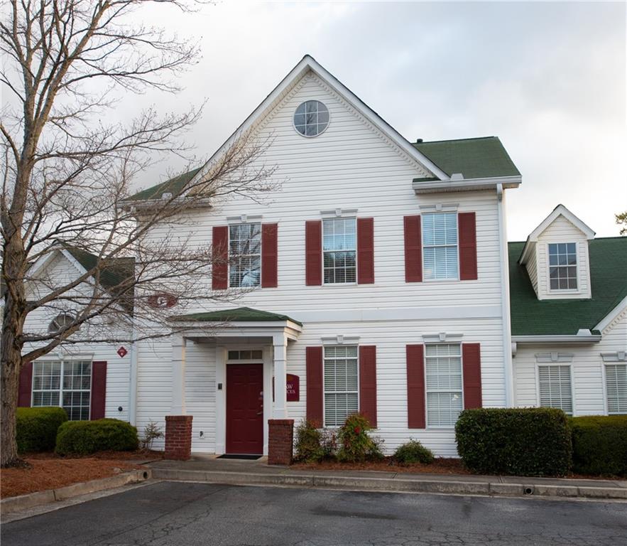 707 Whitlock Avenue Southwest, Unit G5 Marietta, GA 30064 - Photo 1 of 1 a front view of a house
