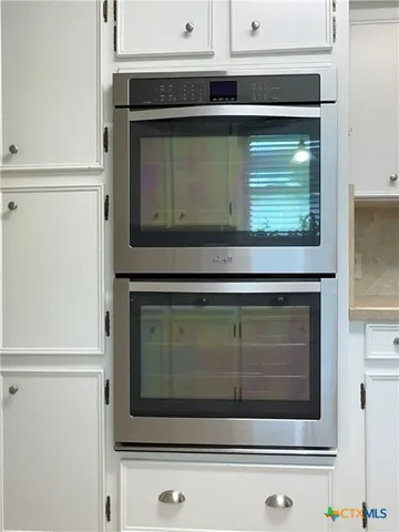 a living room with a fireplace