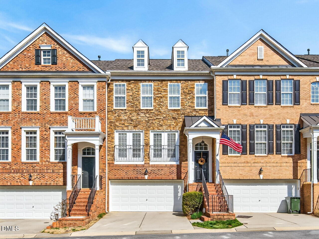 2512 Blooming Street Raleigh, NC 27612 - Photo 1 of 33 a front view of a house with a garden