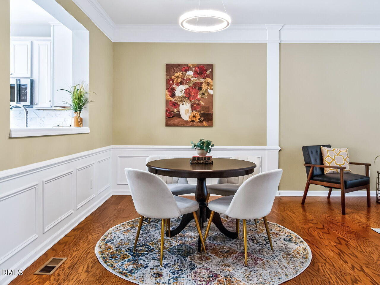 2512 Blooming Street Raleigh, NC 27612 - Photo 12 of 33 a view of a dining room with furniture and wooden floor