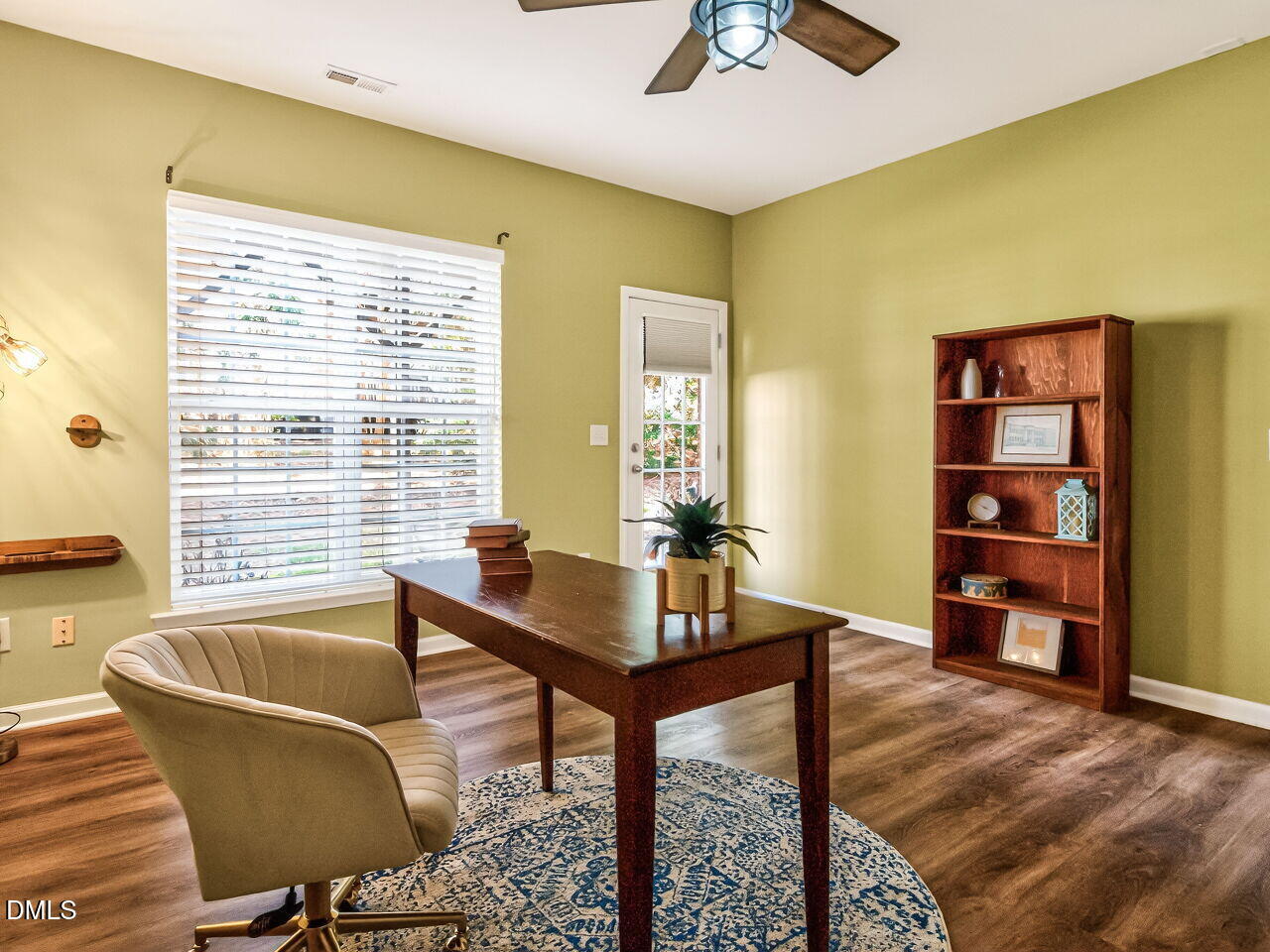 2512 Blooming Street Raleigh, NC 27612 - Photo 30 of 33 a living room with furniture and a window