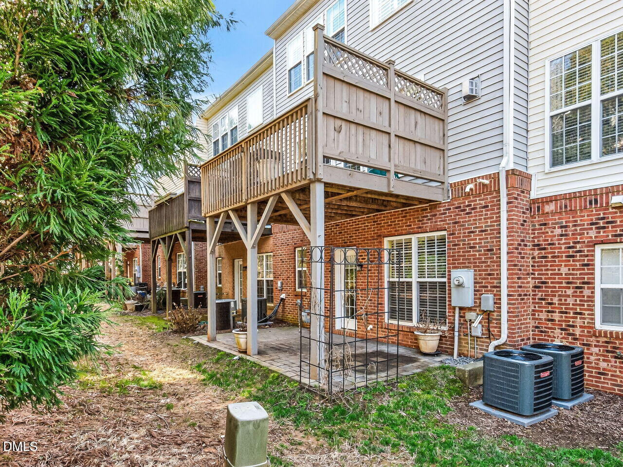 2512 Blooming Street Raleigh, NC 27612 - Photo 33 of 33 a view of a house with backyard and porch