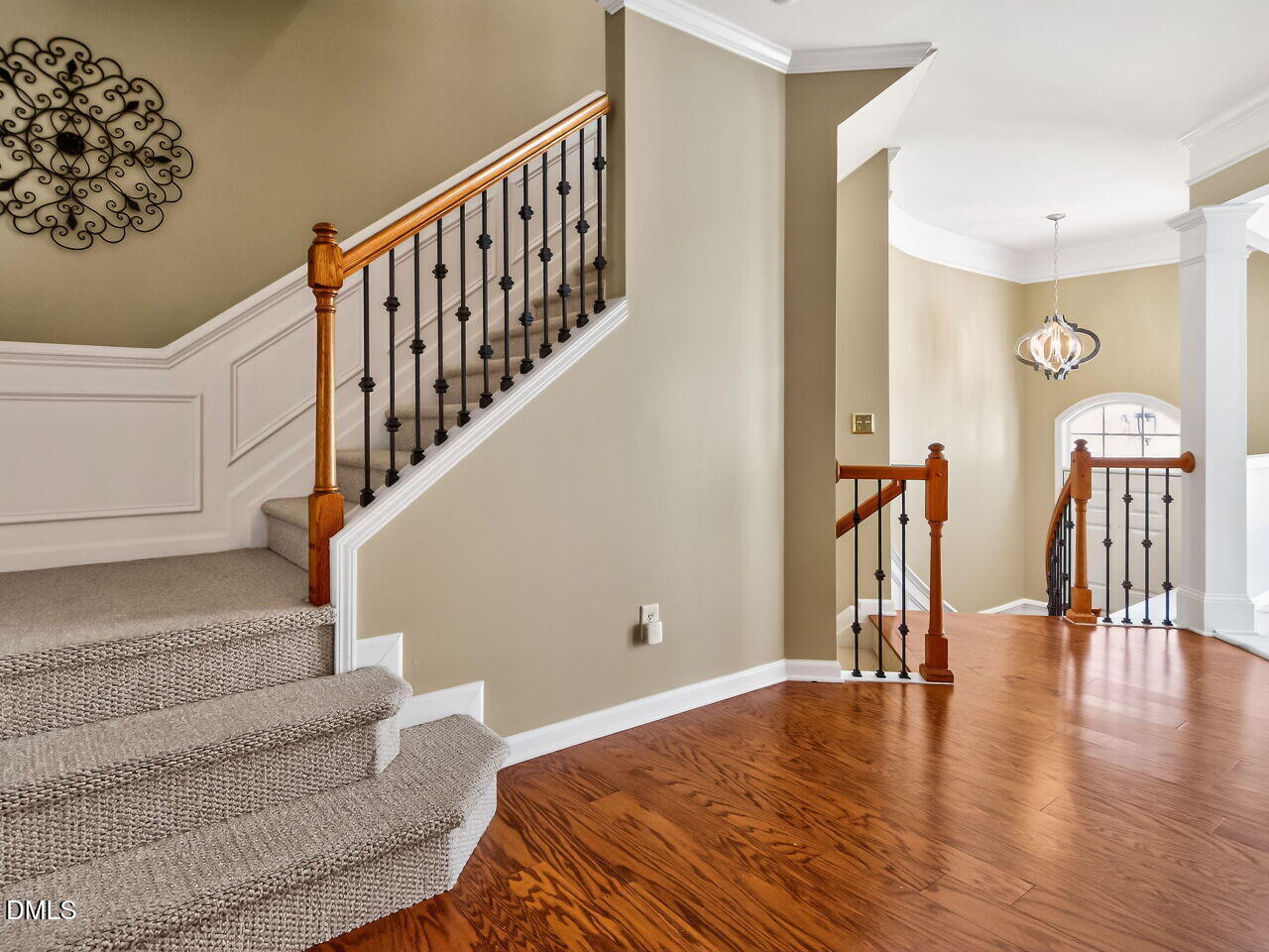 2512 Blooming Street Raleigh, NC 27612 - Photo 5 of 33 a view of entryway and hall with wooden floor