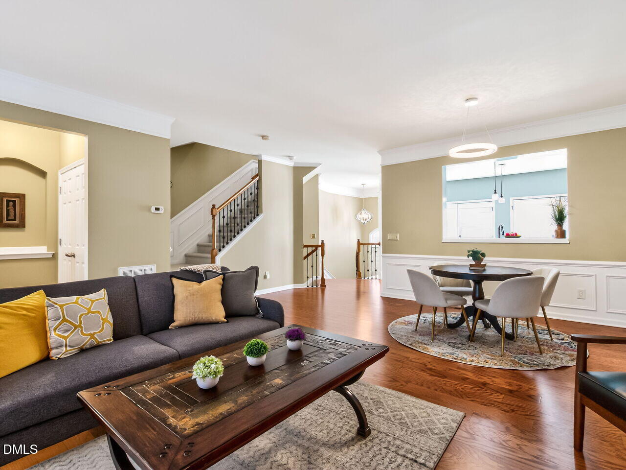 2512 Blooming Street Raleigh, NC 27612 - Photo 8 of 33 a living room with furniture and wooden floor