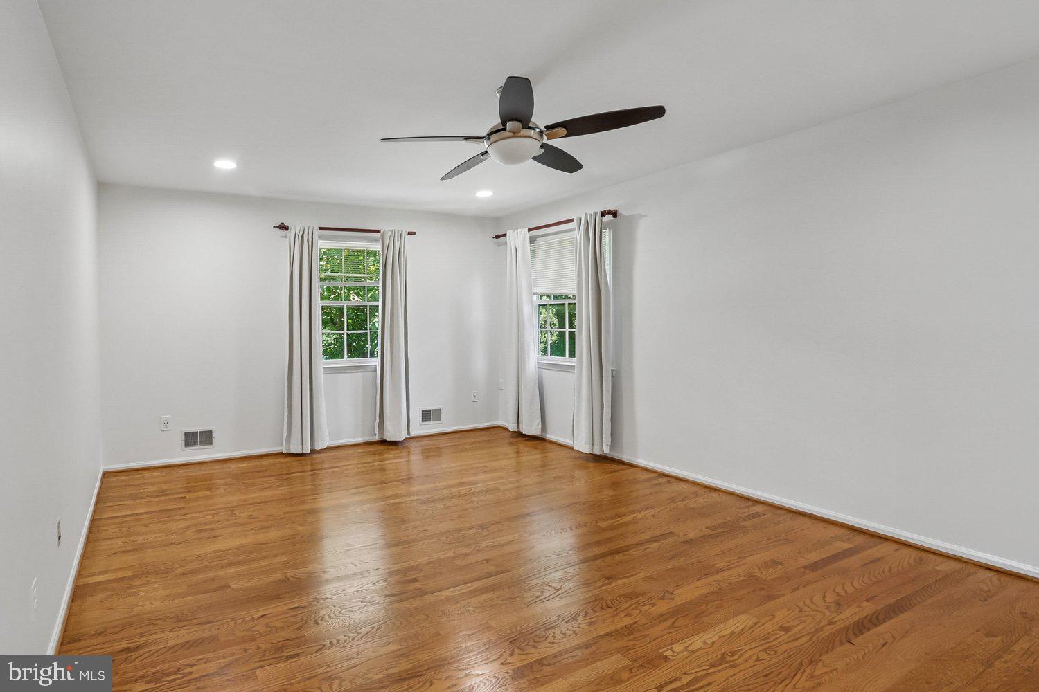 903 Ridge Drive McLean, VA 22101 - Photo 26 of 46 Primary bedroom with hardwood flooring