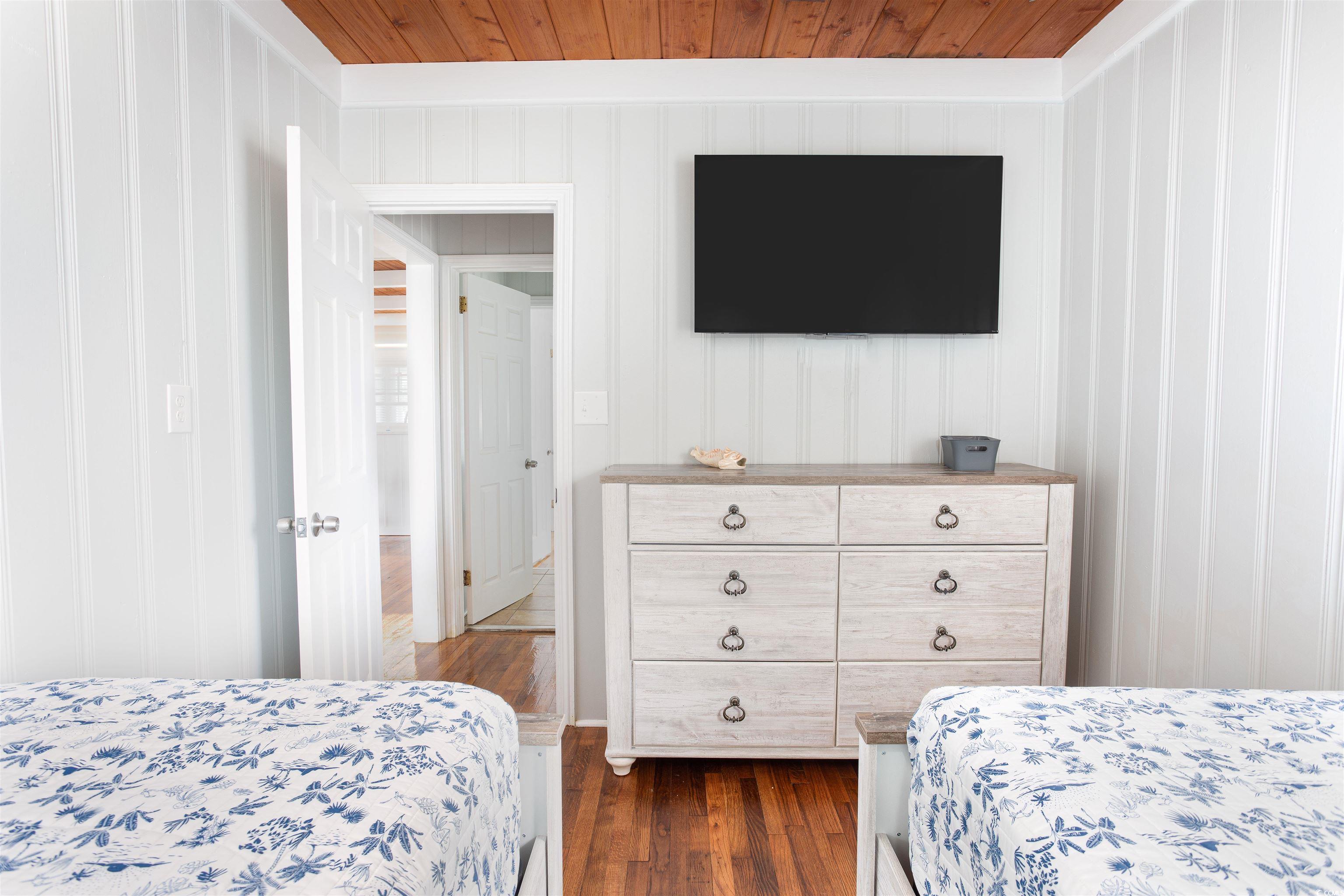 214 Yucca Avenue Murrells Inlet, SC 29576 - Photo 19 of 22 Bedroom featuring dark wood-type flooring and wood ceiling