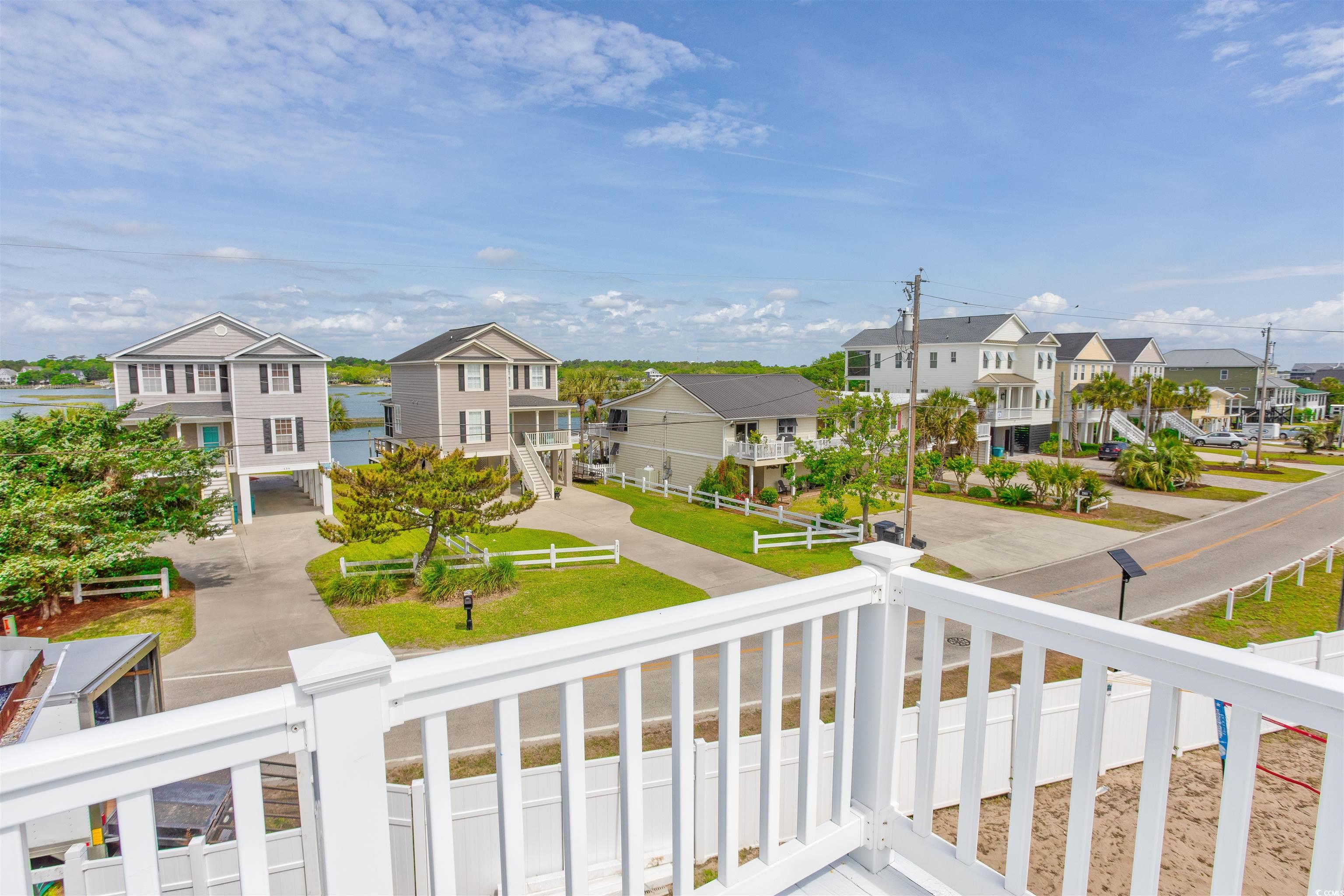 214 Yucca Avenue Murrells Inlet, SC 29576 - Photo 3 of 22 Balcony featuring a residential view