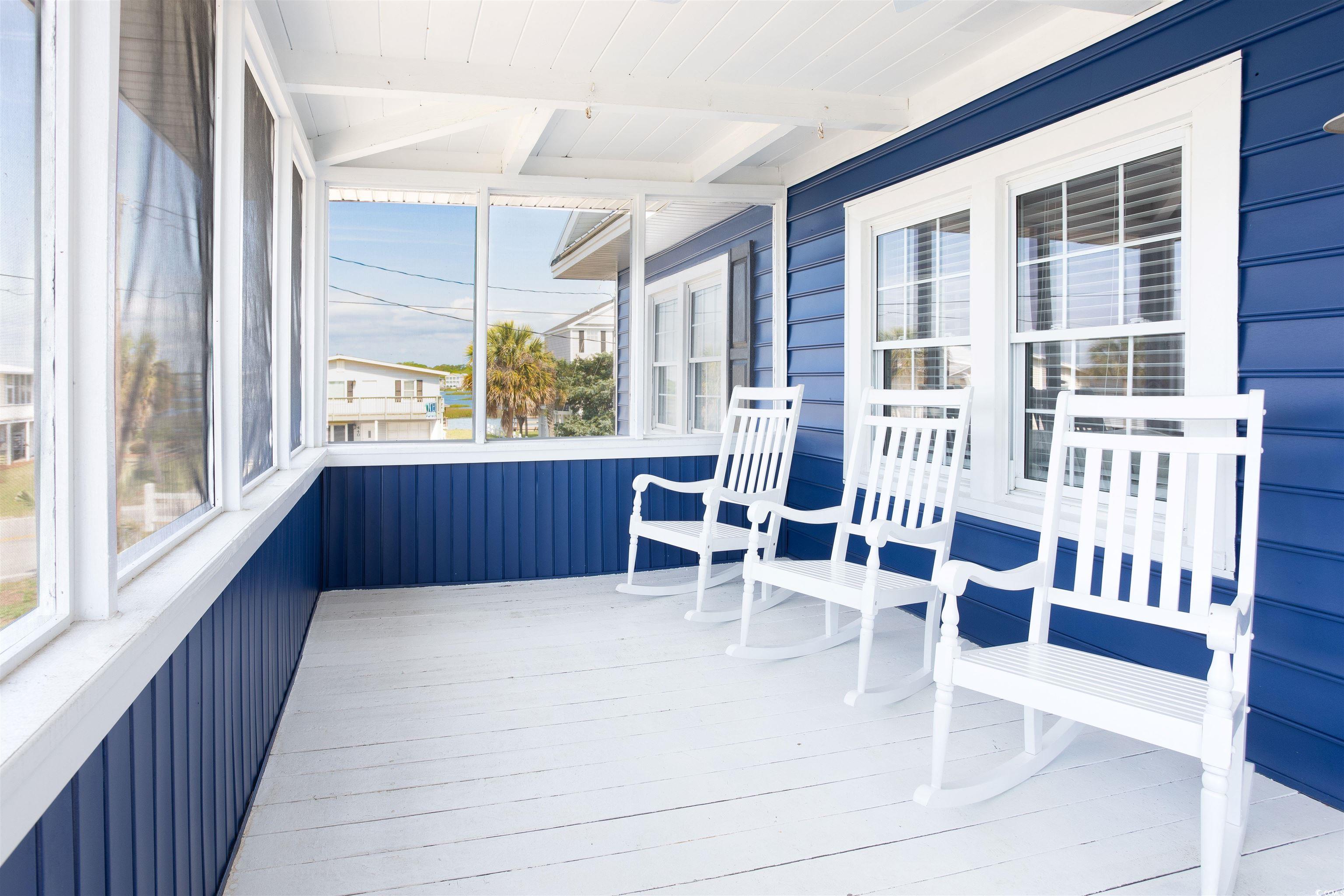 214 Yucca Avenue Murrells Inlet, SC 29576 - Photo 6 of 22 Sunroom with beamed ceiling