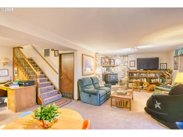 a living room with furniture and a view of living room