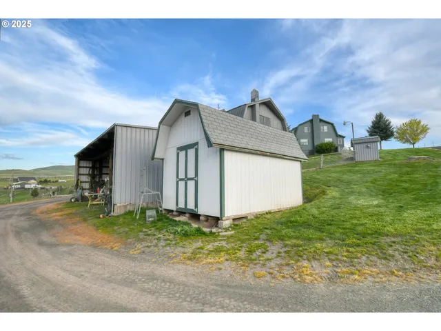 a house view with a garden space