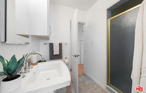 a bathroom with a sink and a toilet