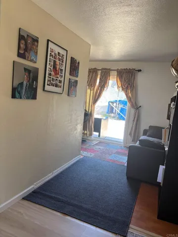 a view of livingroom with furniture and window