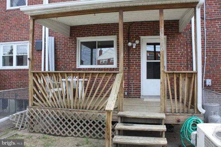 7866 Kavanagh Road Dundalk, MD 21222 - Photo 2 of 14 front view of a house with a window