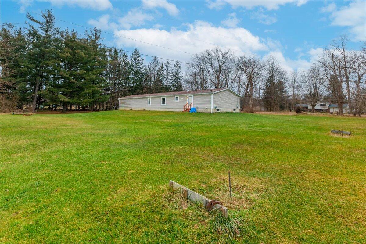 4321 Lone Tree Road Milford, MI 48380 - Photo 3 of 38 07-4321 Lonetree EXT-7