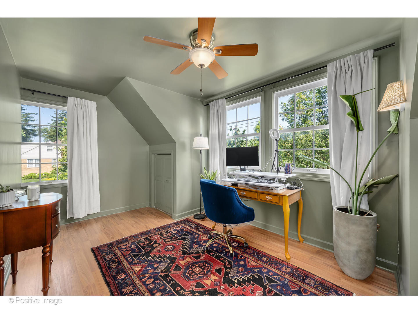 4101 Linden Avenue Western Springs, IL 60558 - Photo 12 of 29 a living room with a large window a dining table and chairs
