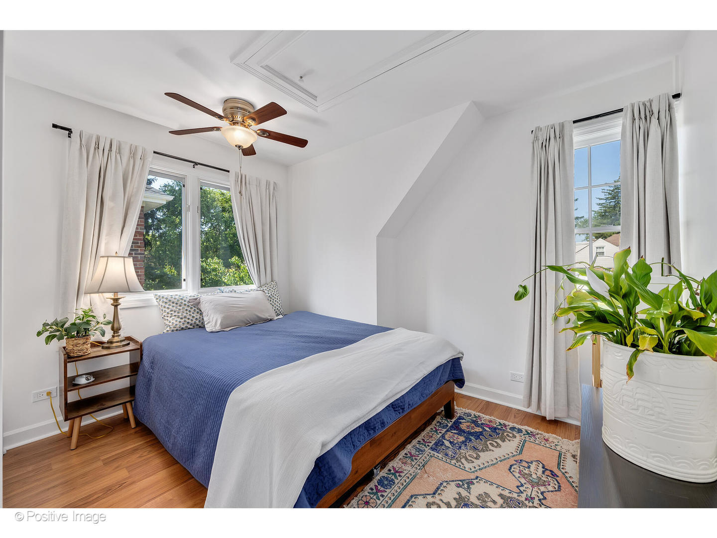 4101 Linden Avenue Western Springs, IL 60558 - Photo 17 of 29 a bedroom with a bed potted plant with the window