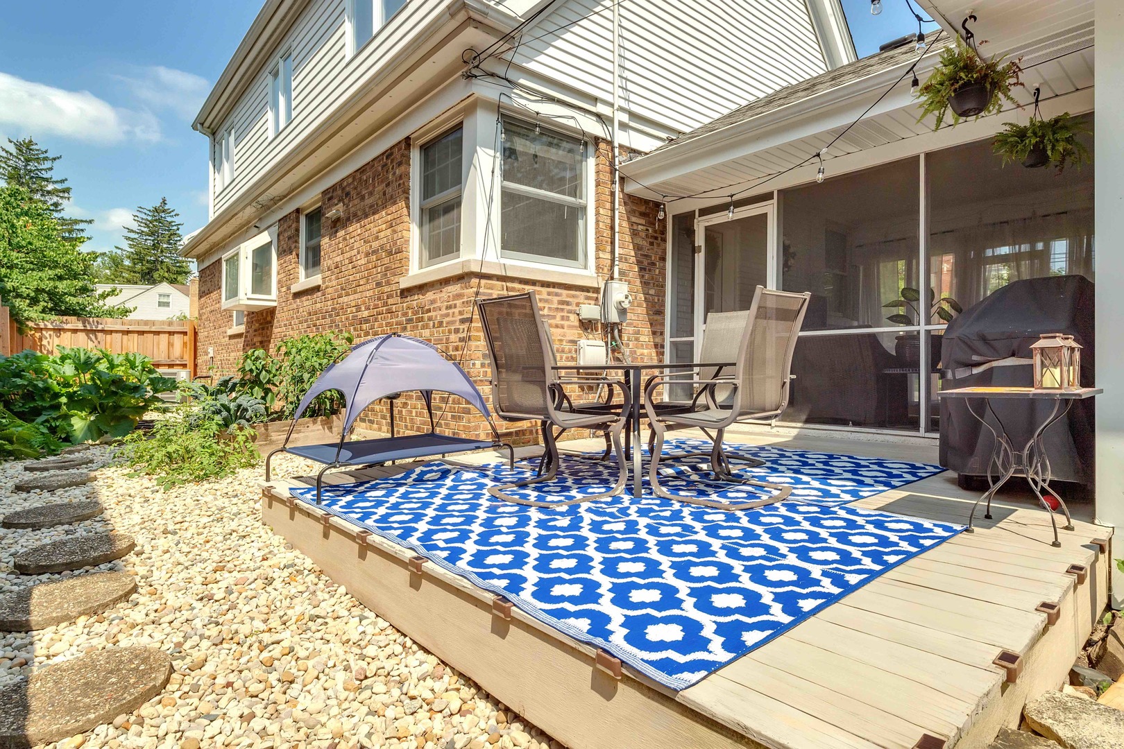 4101 Linden Avenue Western Springs, IL 60558 - Photo 26 of 29 a view of a roof deck with dining table and chairs with wooden floor