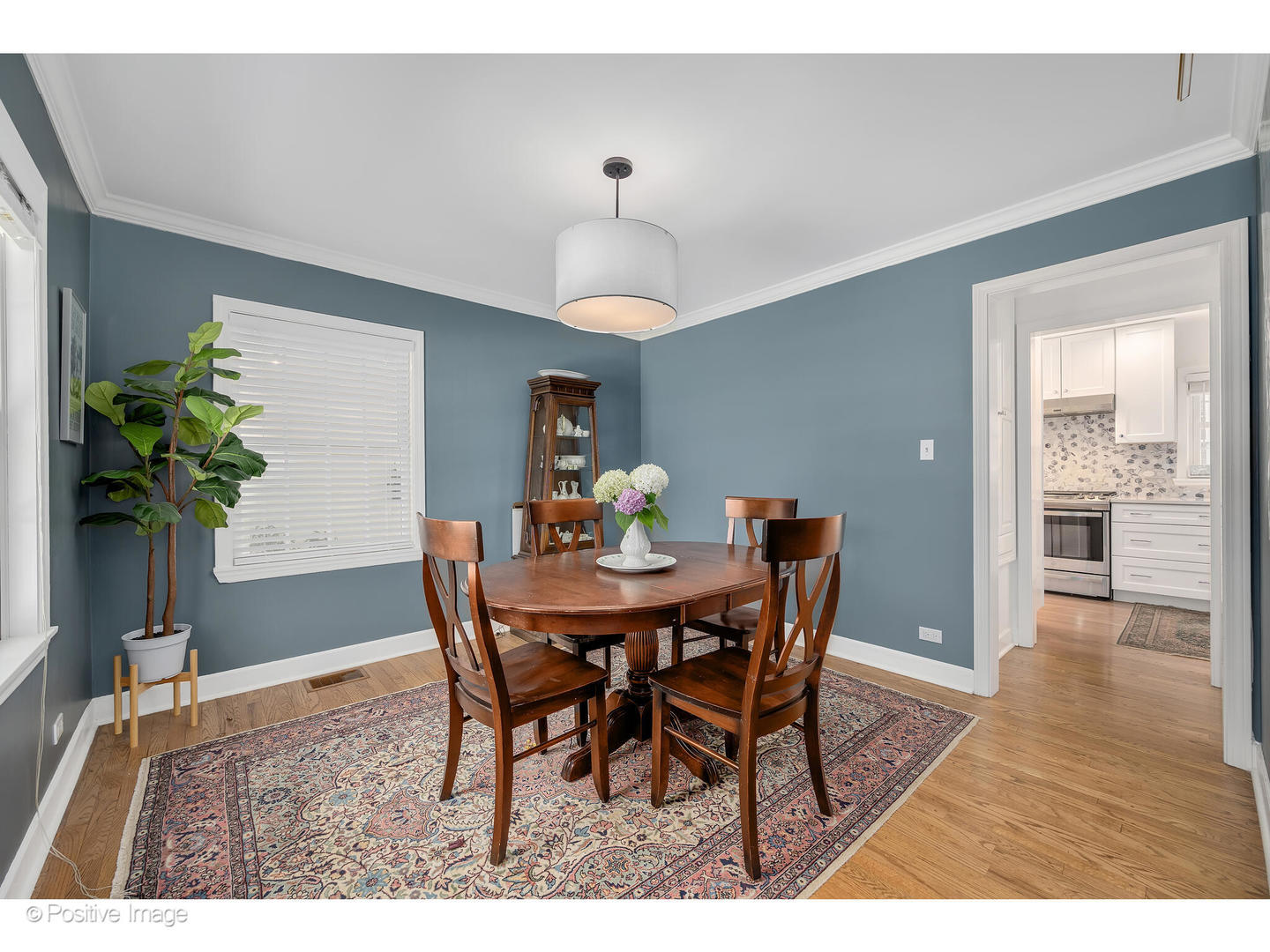 4101 Linden Avenue Western Springs, IL 60558 - Photo 7 of 29 a view of a dining room with furniture and wooden floor