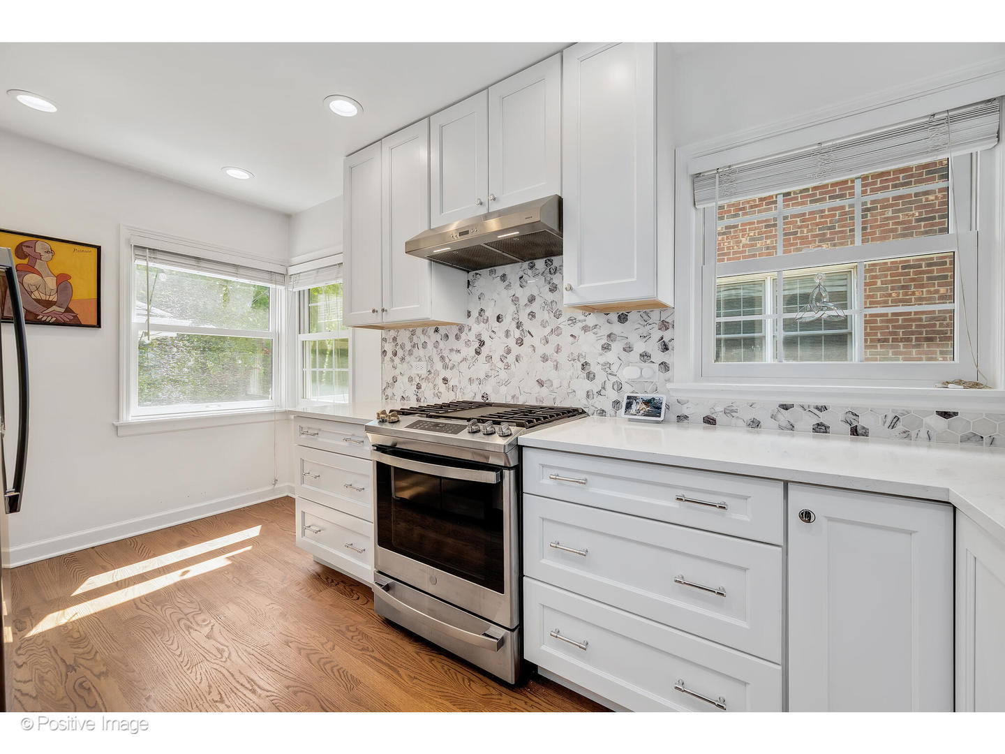 4101 Linden Avenue Western Springs, IL 60558 - Photo 9 of 29 a kitchen with stainless steel appliances granite countertop a stove and a sink