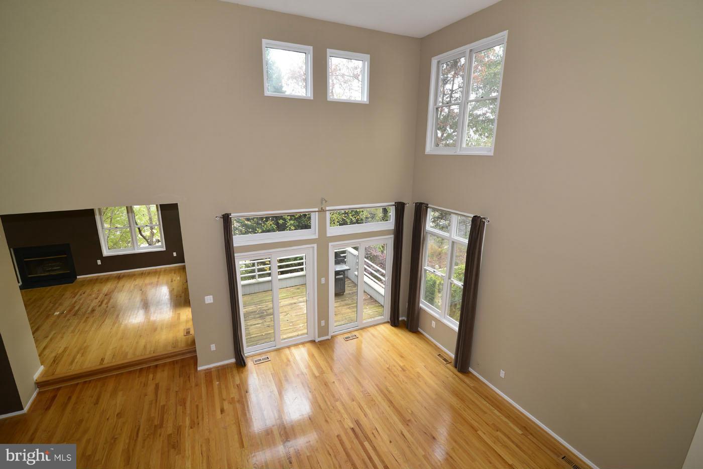 2040 Beacon Place Reston, VA 20191 - Photo 14 of 30 a view of empty room with wooden floor