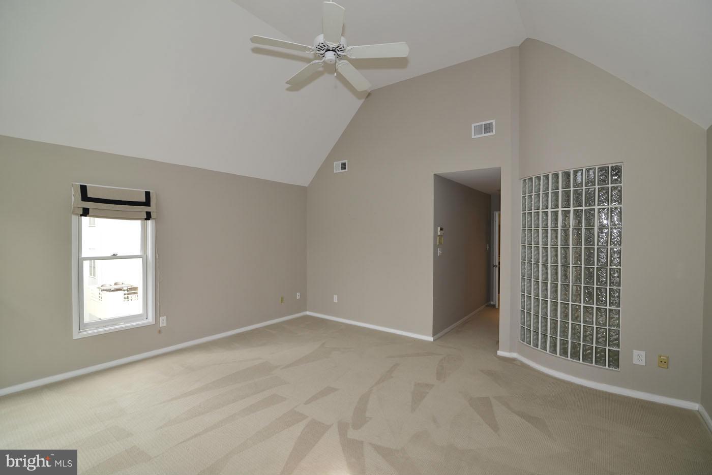 2040 Beacon Place Reston, VA 20191 - Photo 25 of 30 a view of an empty room with a window