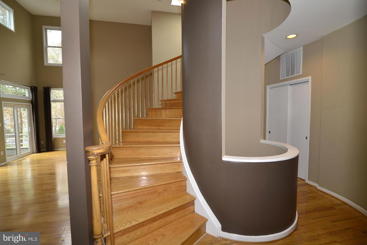 2040 Beacon Place Reston, VA 20191 - Photo 28 of 30 a view of entryway and hall with wooden floor