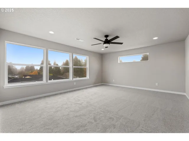 a living room with a couch and a flat screen tv