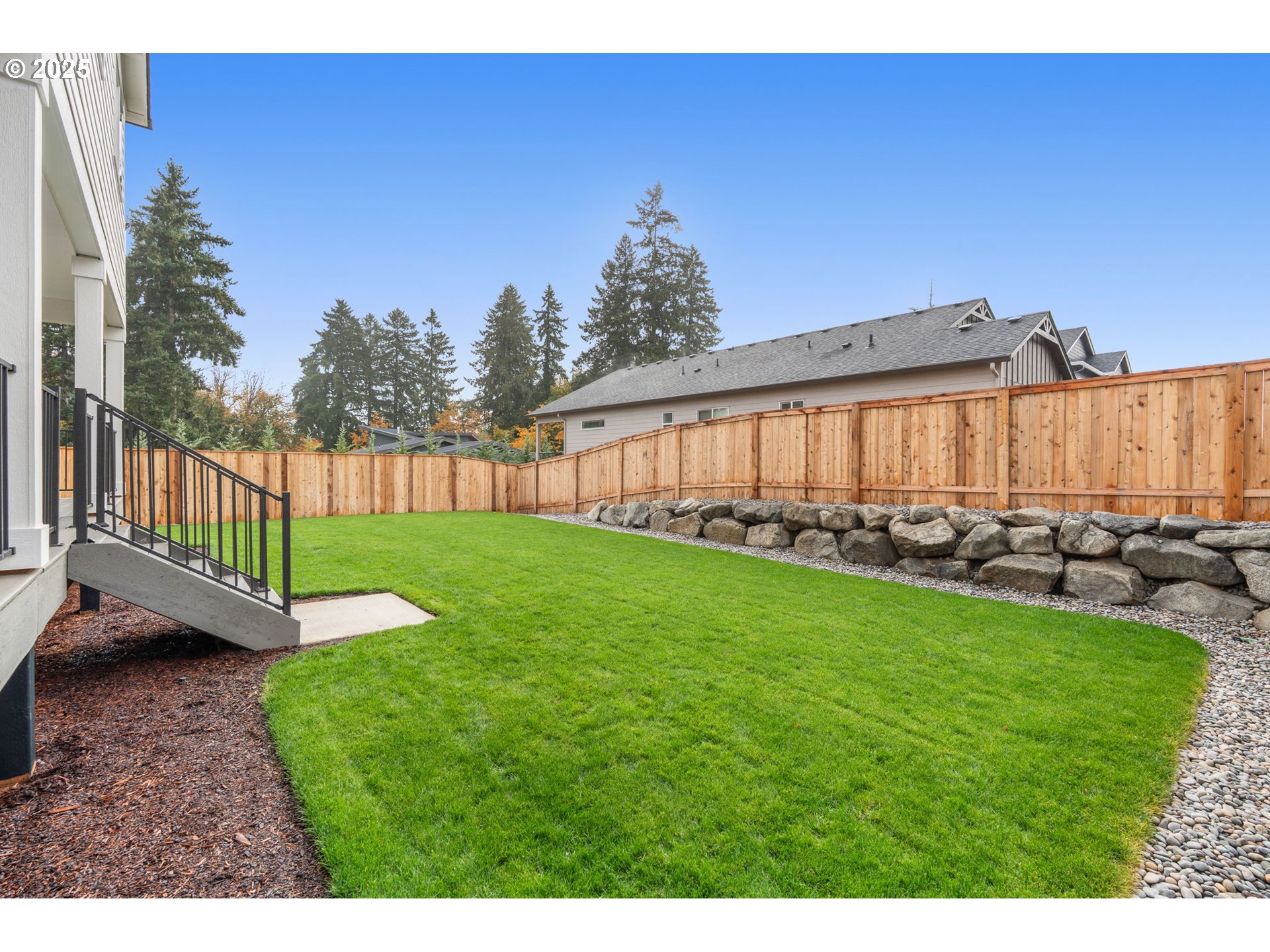 1105 Northwest 111th Circle Vancouver, WA 98685 - Photo 46 of 48 a view of a backyard with wooden fence