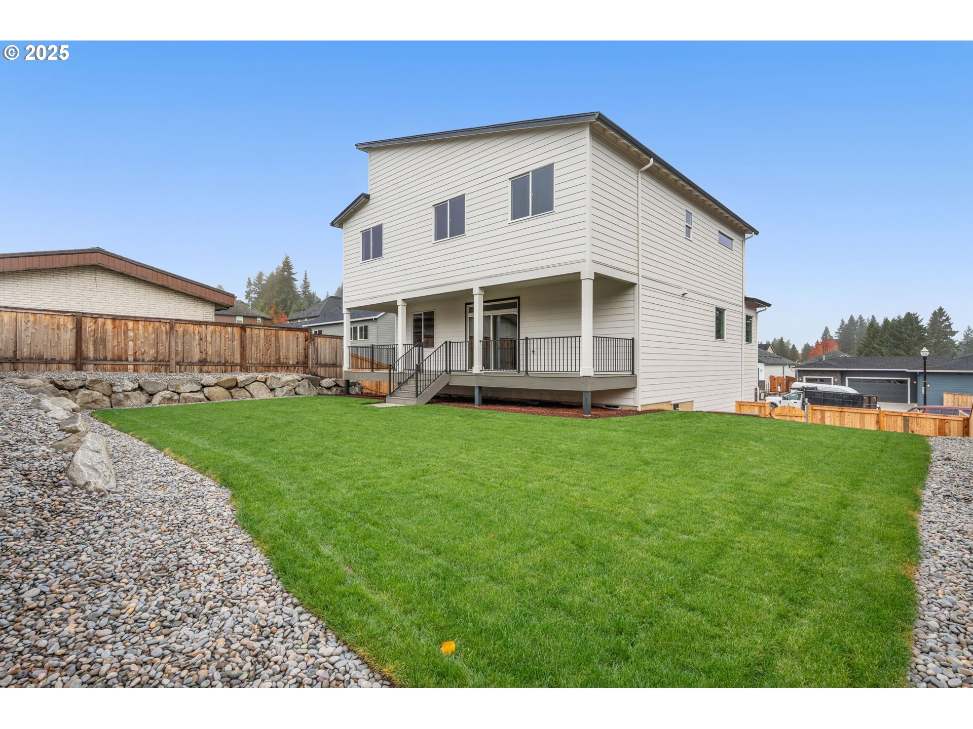1105 Northwest 111th Circle Vancouver, WA 98685 - Photo 47 of 48 a front view of a house with a garden and trees