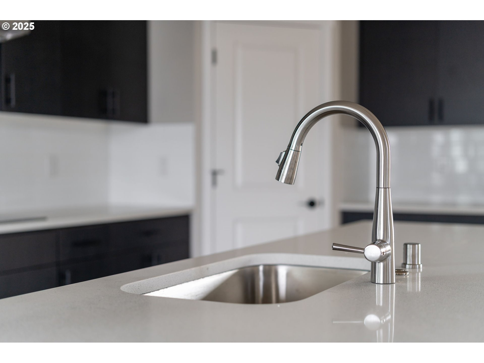 1105 Northwest 111th Circle Vancouver, WA 98685 - Photo 10 of 48 a kitchen with a sink and cabinets