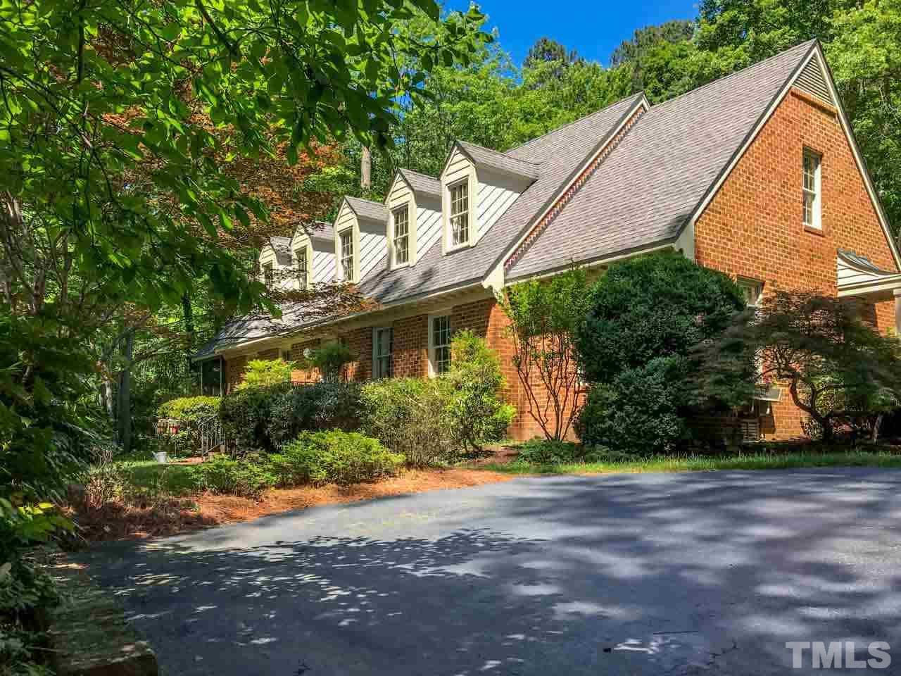 1806 Grande Oaks Road Durham, NC 27712 - Photo 2 of 25 a view of a house with a yard
