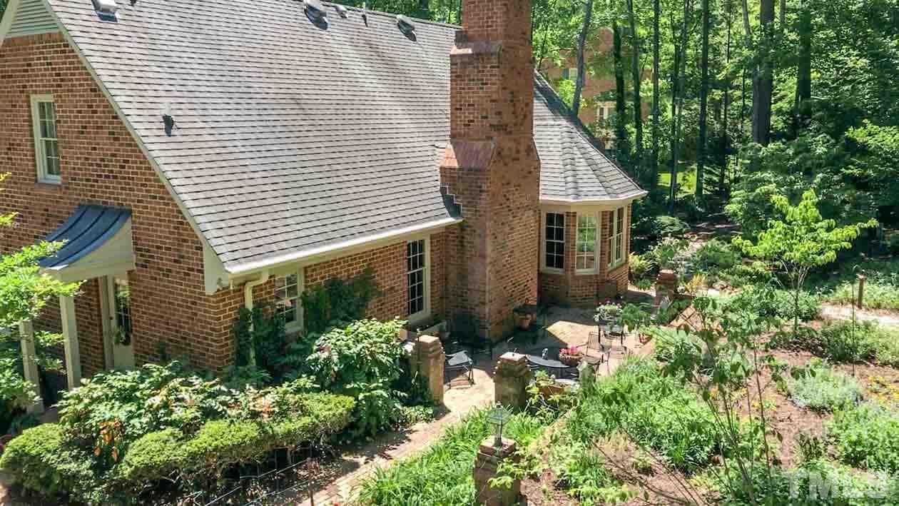 1806 Grande Oaks Road Durham, NC 27712 - Photo 3 of 25 a view of a house with a yard