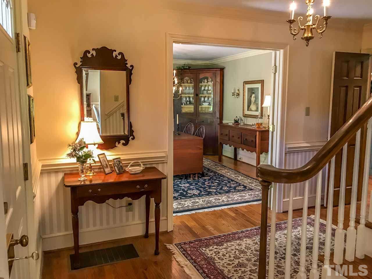 1806 Grande Oaks Road Durham, NC 27712 - Photo 9 of 25 a view of living room with furniture and chandelier