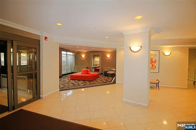 a view of a livingroom with wooden floor