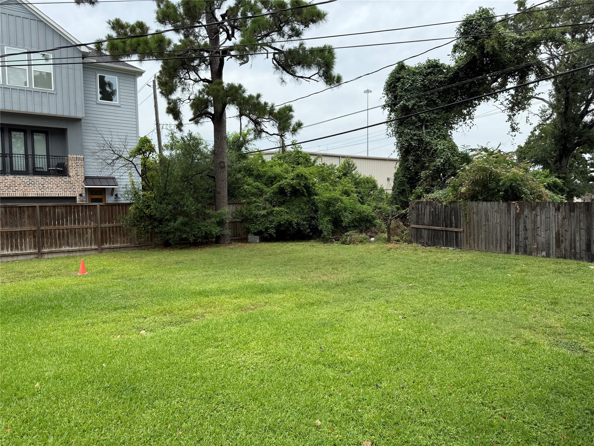 723 West 27th Street Houston, TX 77008 - Photo 21 of 22 a view of backyard with seating and green space