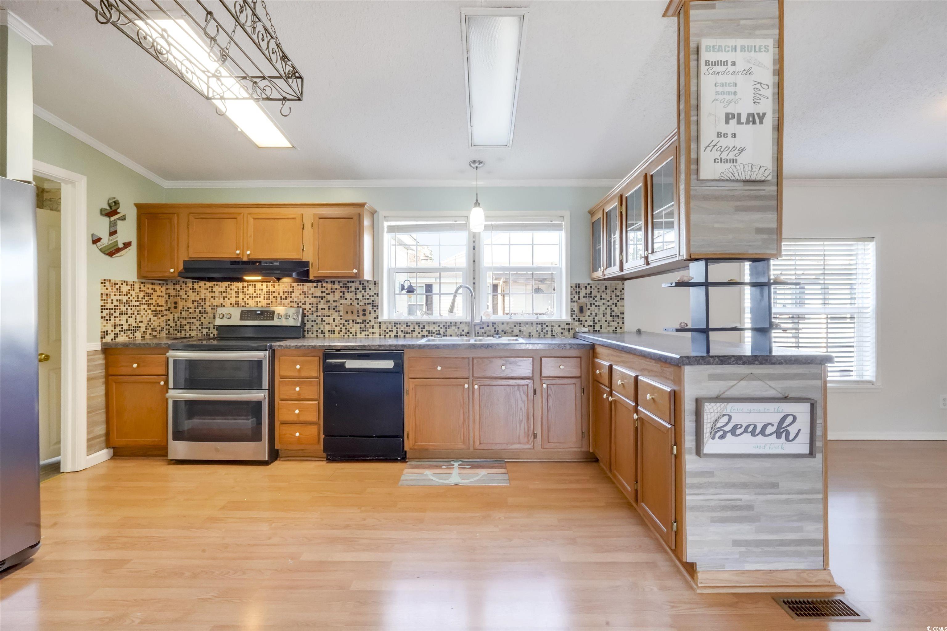 505 Rainbow Drive Murrells Inlet, SC 29576 - Photo 4 of 35 Kitchen featuring sink, appliances with stainless