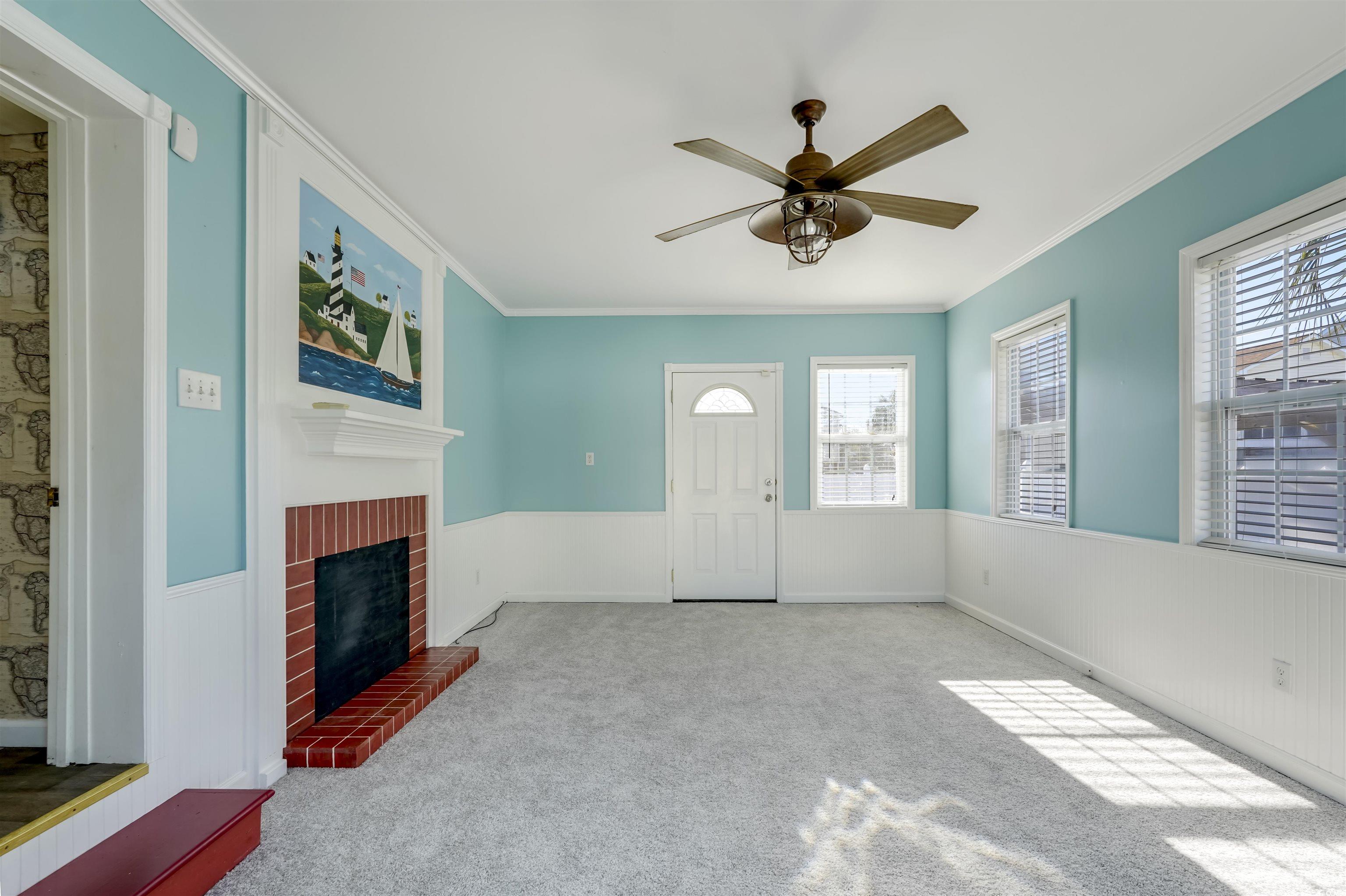 505 Rainbow Drive Murrells Inlet, SC 29576 - Photo 9 of 35 Living room with a brick fireplace, a wealth of na
