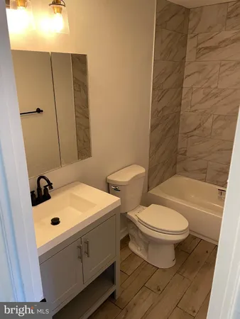 a bathroom with a sink and a toilet