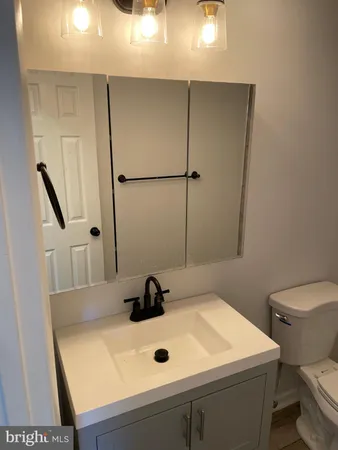 a bathroom with a sink and a toilet