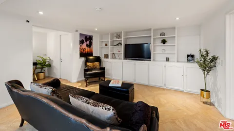 a view of a park with large trees