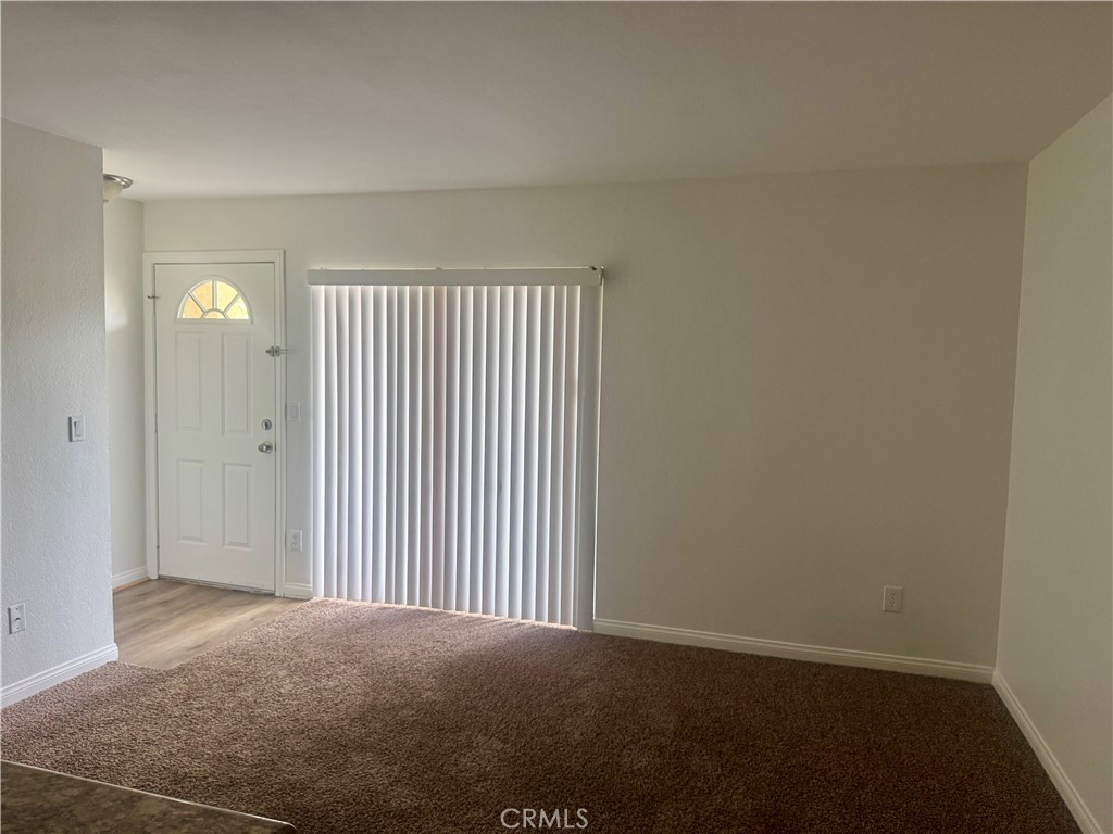 2155 Highpointe Drive Corona, CA 92879 - Photo 2 of 14 an empty room with windows
