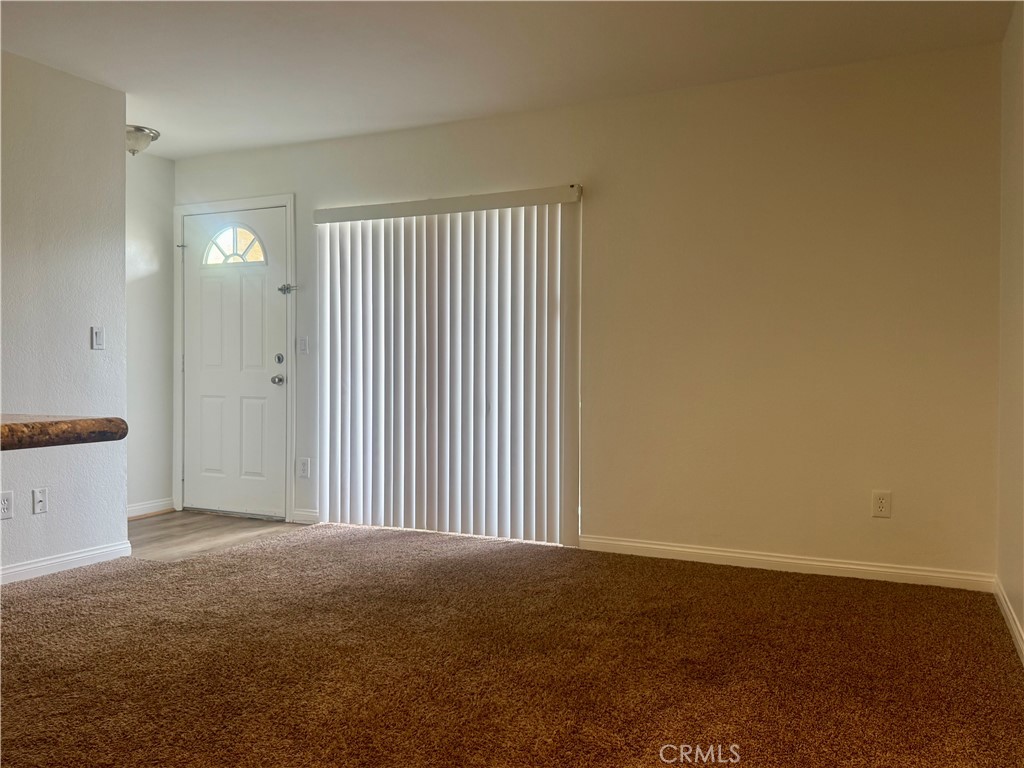 2155 Highpointe Drive Corona, CA 92879 - Photo 4 of 14 a view of a livingroom and an empty room