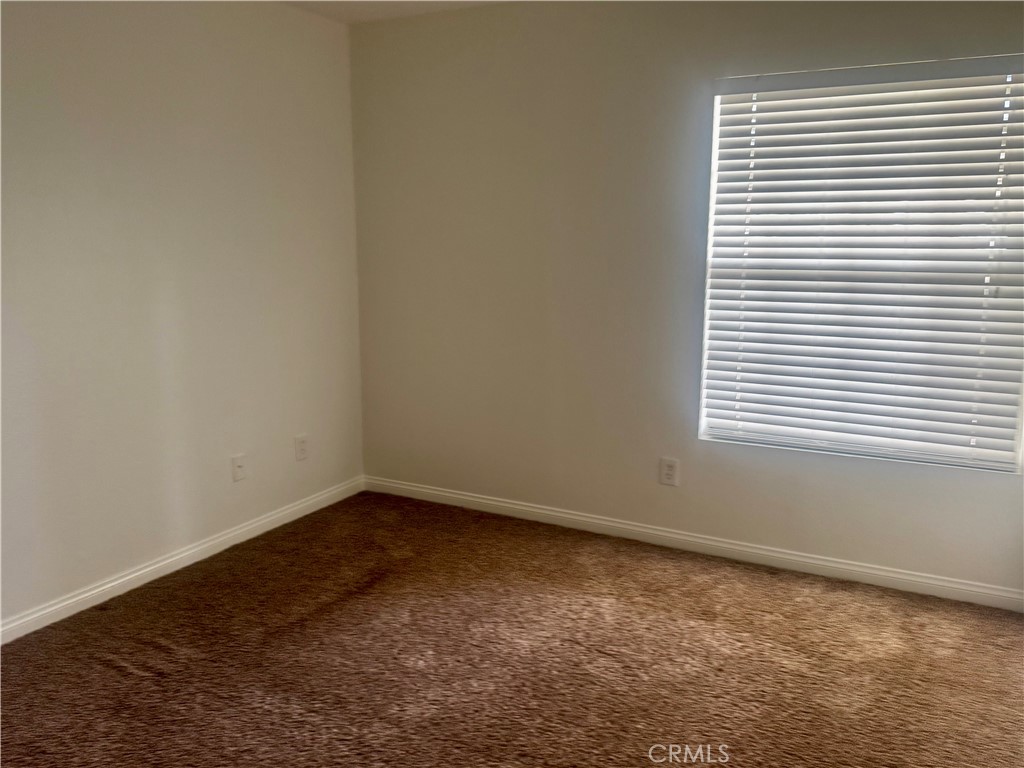 2155 Highpointe Drive Corona, CA 92879 - Photo 8 of 14 an empty room with a window