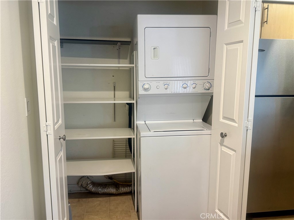 2155 Highpointe Drive Corona, CA 92879 - Photo 10 of 14 a utility room with dryer and washer