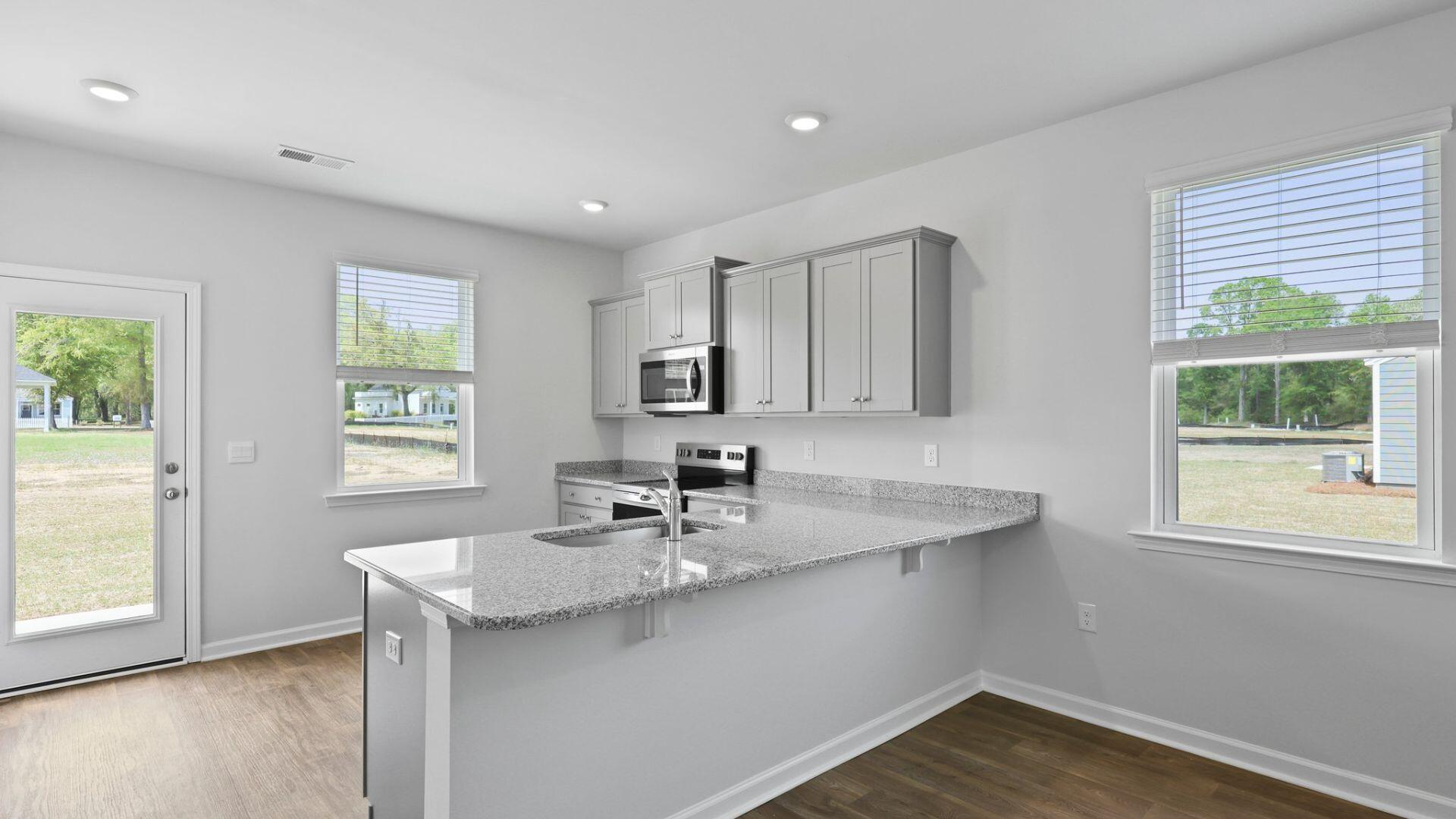 1064 Refuge Way Summerton, SC 29148 - Photo 5 of 26 Lewis Kitchen